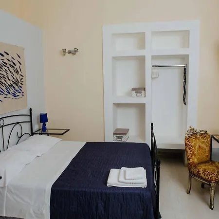 Πανσιόν Calamarina Centro